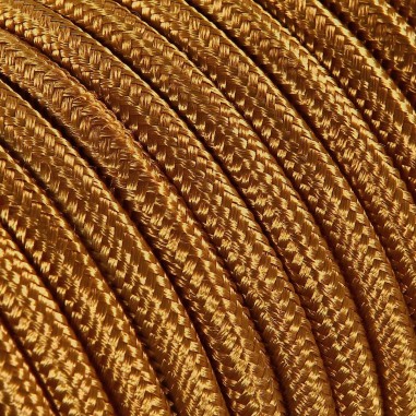 Rundes, farbiges textilummanteltes Elektrokabel in Whiskey