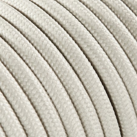 Rundes, farbiges textilummanteltes Elektrokabel in Creme