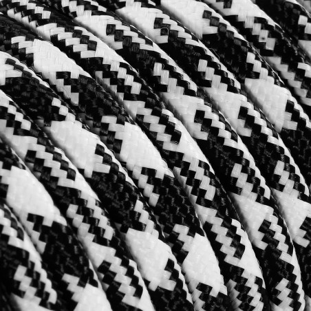 Rundes, farbiges textilummanteltes Elektrokabel im Muster in Schwarz und Weiß